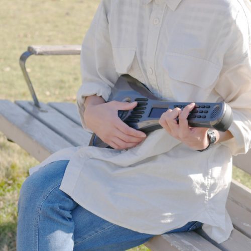 A woman is playng InstaChord